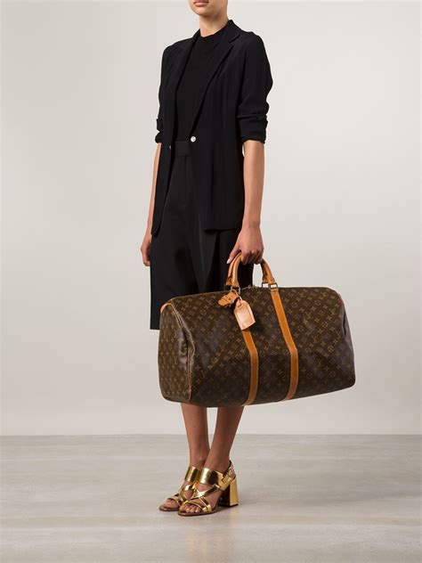 louis vuitton keepall 55 with shoulder strap|Louis Vuitton 55 carry on.